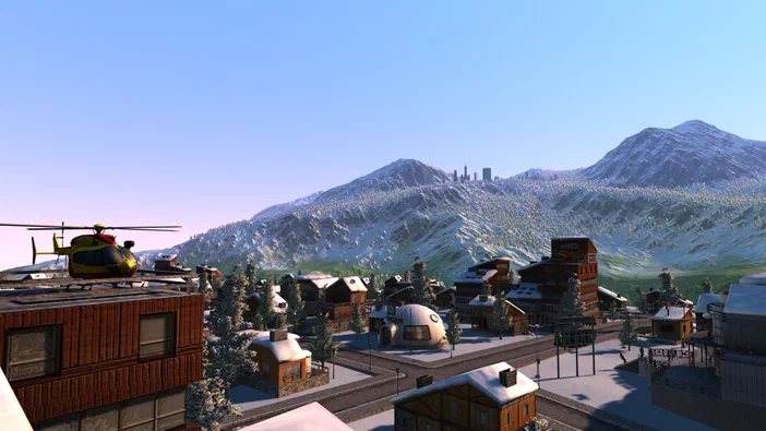Capture d'écran du jeu Cities XL Platinum montrant une ville enneigée avec des bâtiments et un hélicoptère au premier plan.
