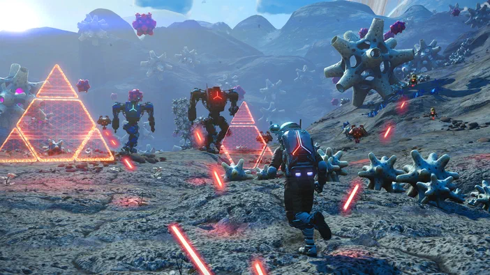 Capture d'écran du jeu vidéo No Man's Sky montrant un personnage en armure sur une planète étrange avec des pyramides lumineuses et des créatures flottantes.