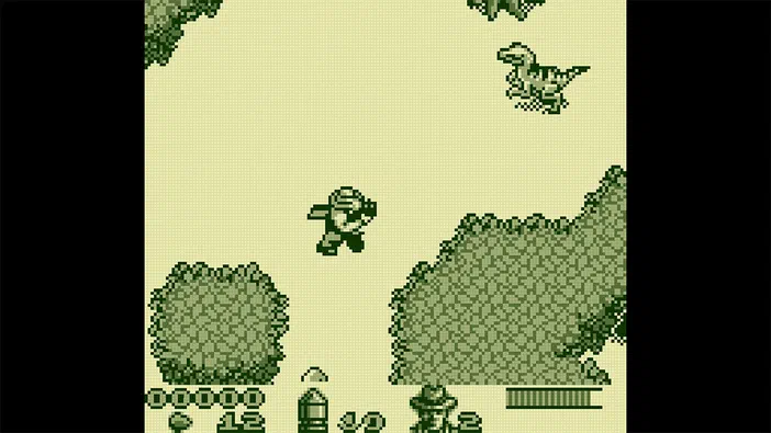 Capture d'écran du jeu Jurassic Park Classic Games Collection montrant un dinosaure et des arbres en pixel art sur fond beige.