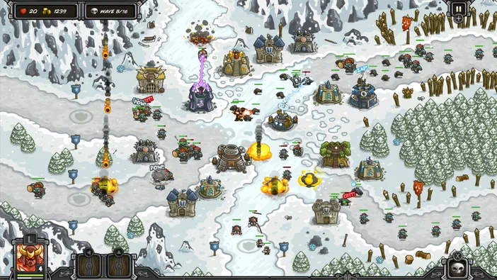 Capture d'écran du jeu de stratégie Kingdom Rush montrant une carte enneigée avec des tours et unités en combat contre l'ennemi.