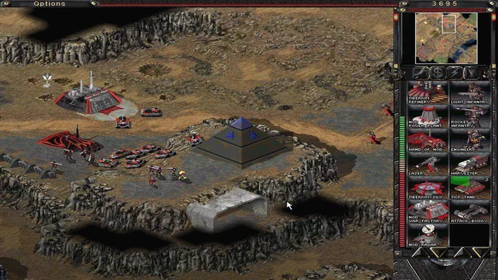 Capture d'écran de la stratégie Command & Conquer Tiberian Sun montrant une base avec des unités et bâtiments sur un terrain rocheux.