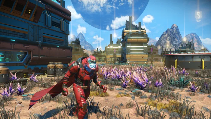 Dans le jeu vidéo No Man's Sky, un personnage en armure rouge se tient au milieu d'une planète aride parsemée de fleurs violettes et de structures futuristes sous un ciel bleu avec une lune.