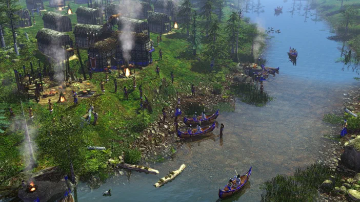 Vue aérienne d'un village autochtone dans Age of Empires III avec des canoës sur une rivière et des habitations en bois.