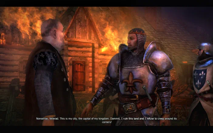 Dans The Witcher: Enhanced Edition, Geralt de Rive discutant avec Velerad devant une maison en feu.