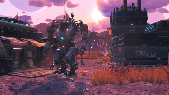 Dans le jeu vidéo No Man's Sky, un robot se tient au centre d'une base spatiale sous un ciel rose et violet.