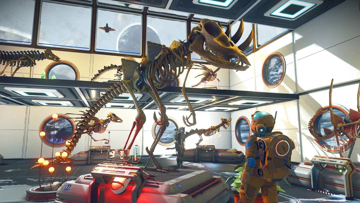 Dans No Man's Sky, un astronaute observe une salle remplie de squelettes d'animaux extraterrestres.