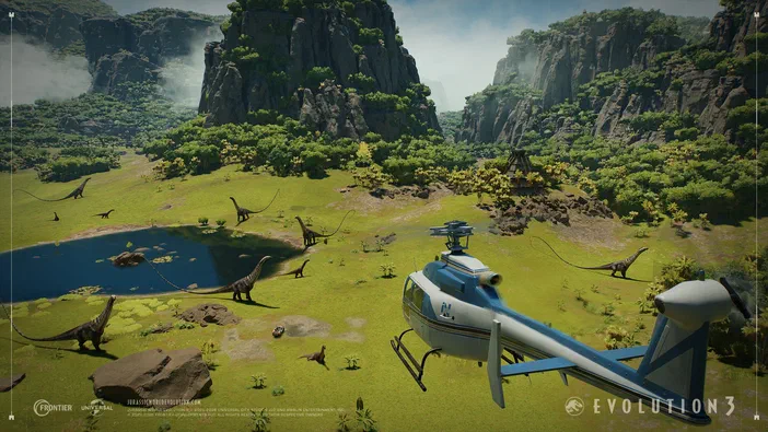 Dans le jeu Jurassic World Evolution 3 Rebirth, une hélicoptère survole un paysage verdoyant où plusieurs dinosaures se promènent près d'un lac et de falaises rocheuses.