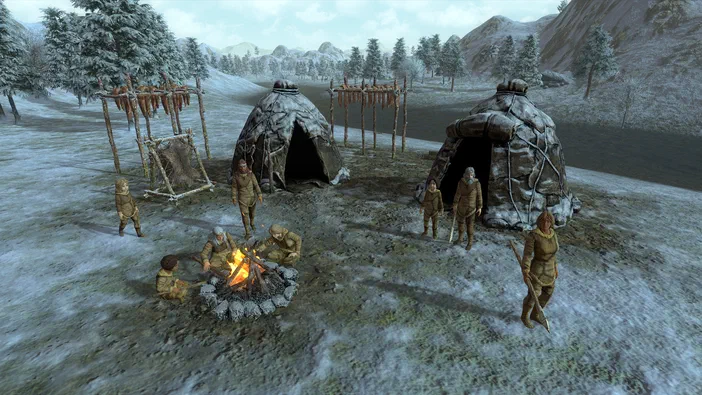 Dans le jeu vidéo Dawn of Man, un campement de tribus préhistoriques se dresse dans une plaine enneigée avec des tipis et des personnages autour d'un feu.