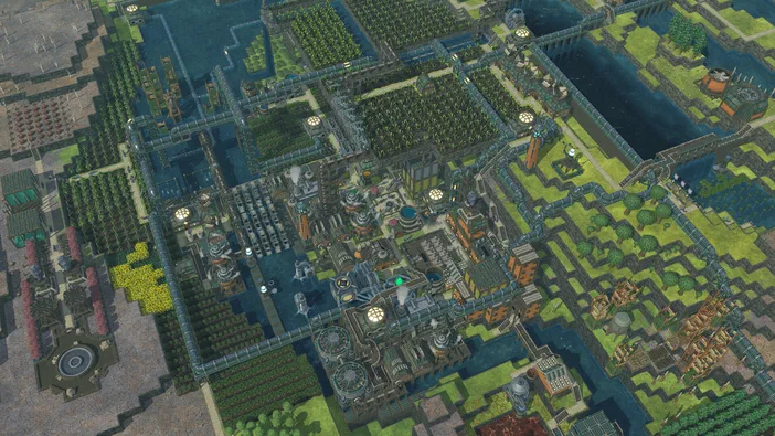 Vue aérienne d'une ville industrielle complexe dans le jeu vidéo Timberborn.