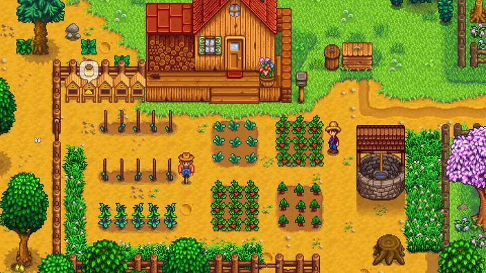 Capture d'écran du jeu Stardew Valley montrant une ferme avec des cultures et un personnage dans le style pixel art.
