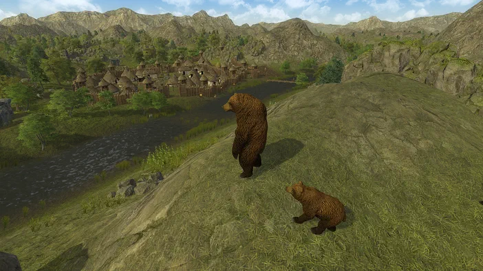 Dans le jeu Dawn of Man, deux ours se tiennent sur une colline herbeuse face à un village primitif entouré de montagnes.