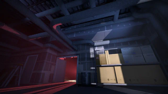 Capture d'écran du jeu vidéo The Stanley Parable montrant un couloir industriel avec des tuyaux au plafond et une lumière rougeâtre.