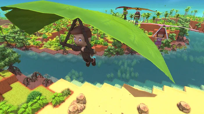 Dans le jeu vidéo Dinkum, un personnage suspendu à une aile de parapente survole des îles tropicales et une rivière bleue.