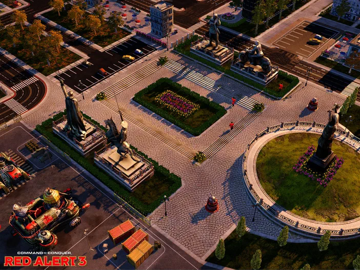 Vue aérienne d'une place de Command & Conquer Red Alert 3 avec des statues et un véhicule militaire rouge.