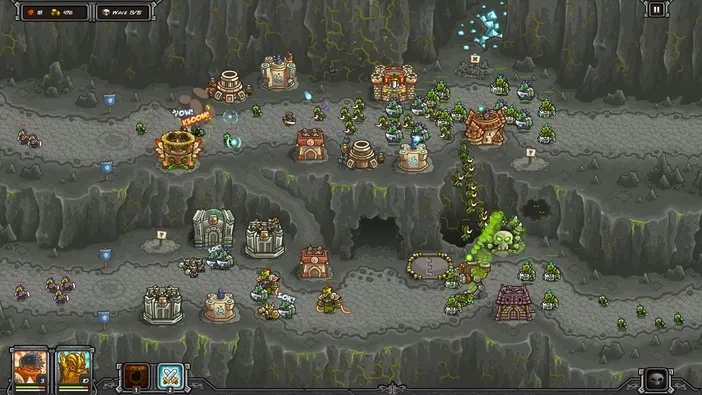 Capture d'écran du jeu Kingdom Rush Frontiers montrant une carte de niveau avec des tours et des unités sur un terrain rocheux.