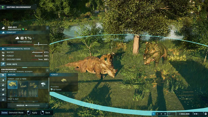 Dans Jurassic World Evolution 2, l'interface d'édition de l'environnement montre deux dinosaures dans une zone forestière avec des indicateurs de confort et de besoins environnementaux.