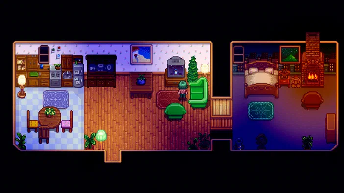 Vue intérieure de la maison du joueur dans Stardew Valley, montrant une cuisine à gauche et un salon avec lit à droite.