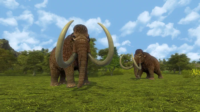 Capture d'écran du jeu vidéo Dawn of Man montrant deux mammouths à poils longs dans un paysage herbeux sous un ciel bleu.