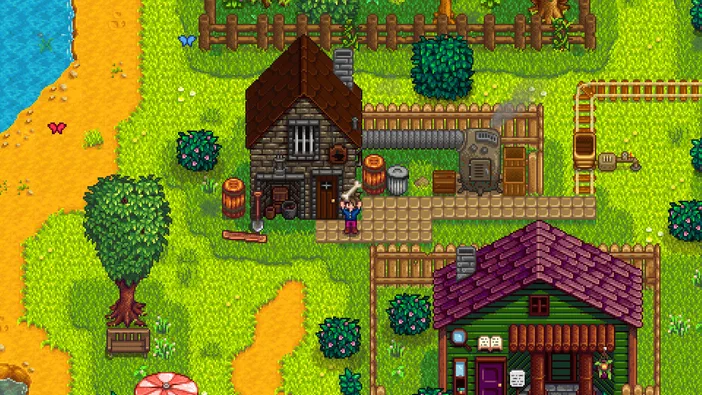 Capture d'écran du jeu Stardew Valley montrant une ferme avec des bâtiments en bois et un personnage devant la maison principale.