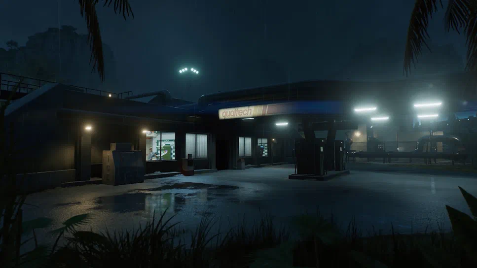 Vue noctuelle d'un bâtiment de Jurassic World Evolution 3 Rebirth sous la pluie
