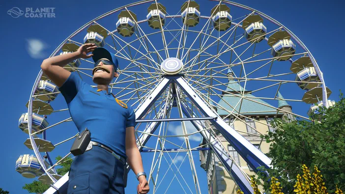 Capture d'écran du jeu Planet Coaster montrant un employé de parc devant une grande roue.