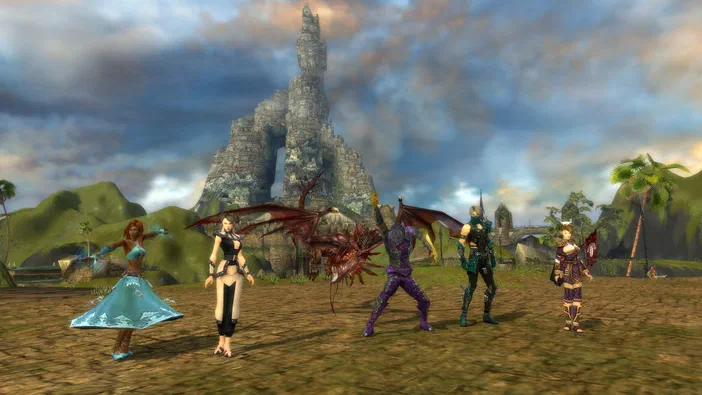 Capture d'écran de Guild Wars Reforged montrant cinq personnages et deux dragons devant une tour en pierre sous un ciel nuageux.