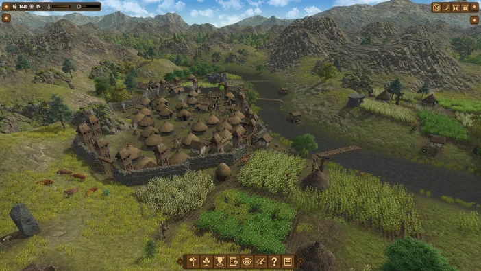 Capture d'écran du jeu Dawn of Man montrant un village préhistorique entouré de champs et de montagnes.